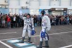 Cosmonauts Yurchihin and Fisher on report to the State Commission Chairman